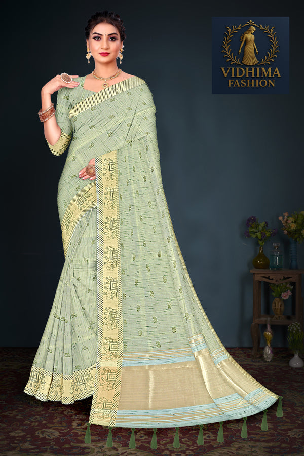 Pastel Green Handloom Cotton Saree with Tribal Motif Border and Green Tassels