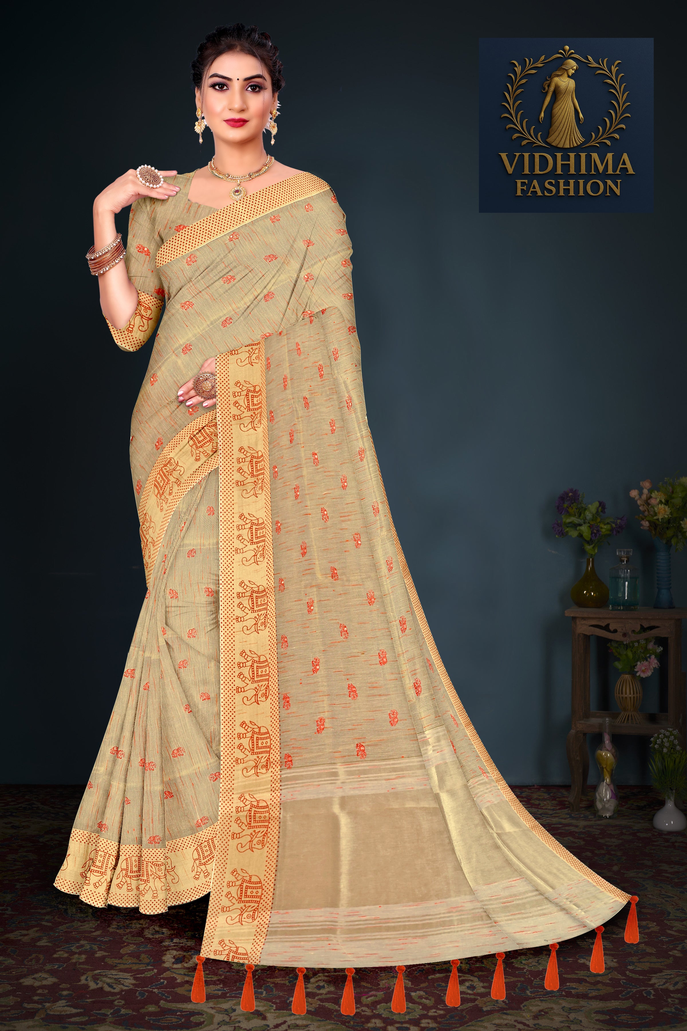 Beige Handloom Cotton Saree with Orange Tribal Motif and Tassel Border