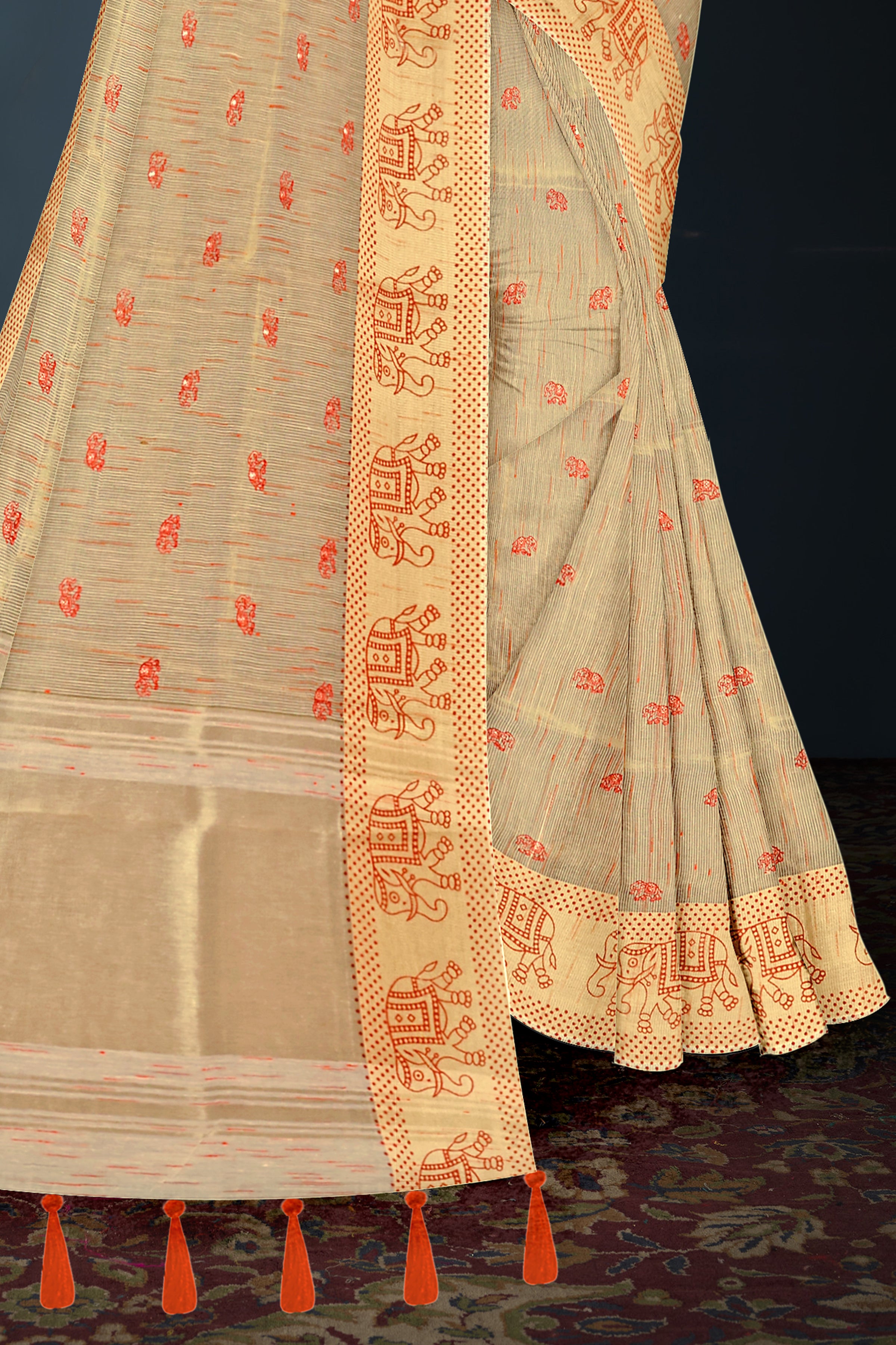 Beige Handloom Cotton Saree with Orange Tribal Motif and Tassel Border